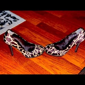 Brown and creme colored cow print size 7 heels